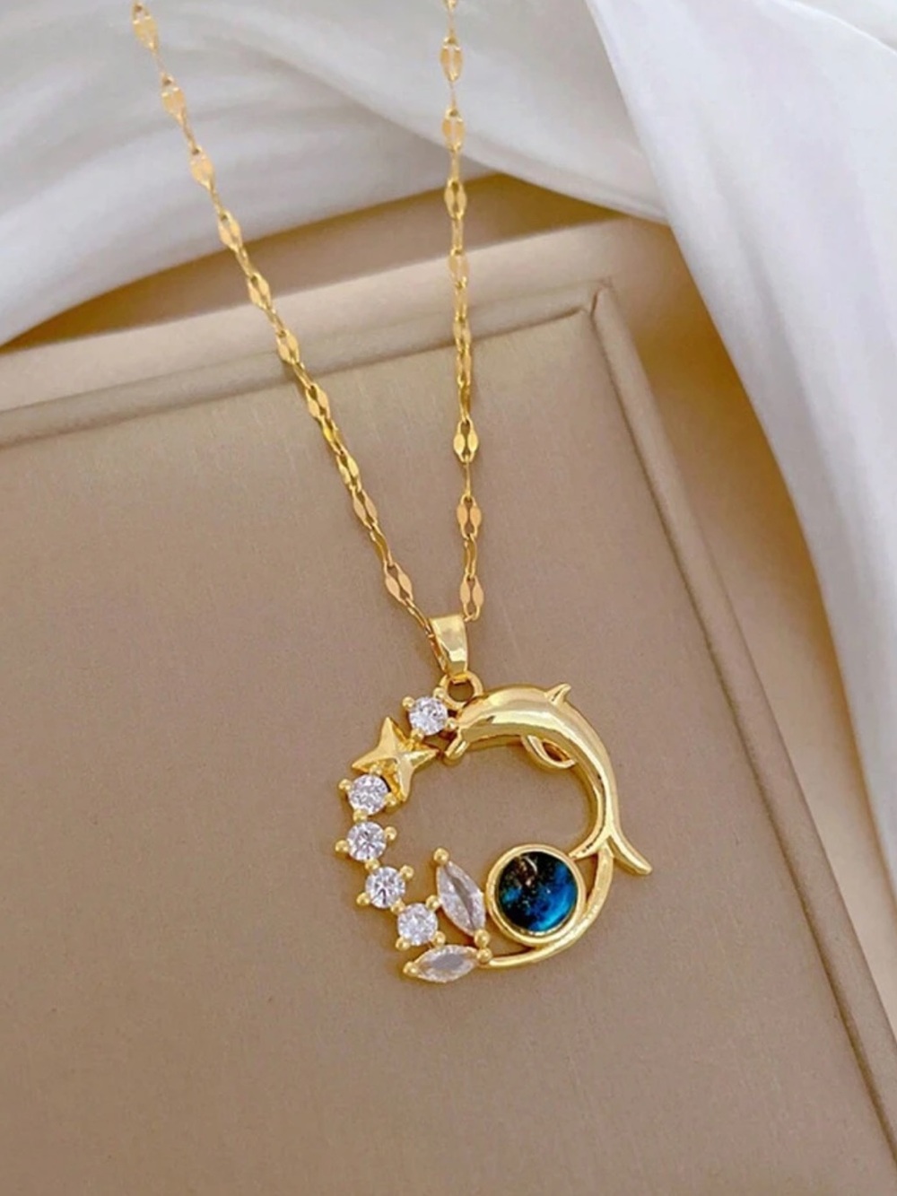 Gold Dolphin Crescent Necklace with Blue Orb and Crystal Accents